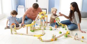 Family playing with track