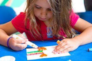 Child coloring at NOMA