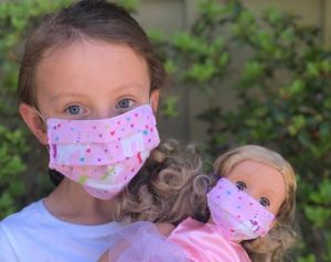 Make masking fun for your child by allowing them to have matching masks with a favorite doll or toy